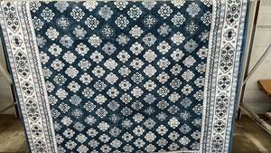 lot 7 image: Wyatt & Ash 53 x 75 Machine Washable Area Rug with Skid Resistant Backing