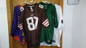 lot 322 image: Football and Hockey Jerseys (4) Browns, Notre Dame.
