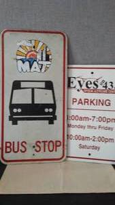 lot 230 image: Metal Mat Bus Sign plus. 12 in. W x 24 in. T