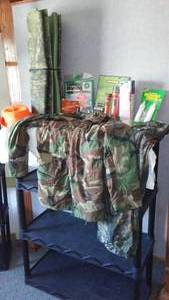 lot 301 image: Camo Poncho, Lights And More.
