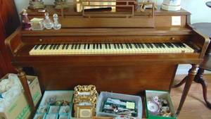 lot 20 image: Gulbranson Walnut Piano. (Contents on piano Not included)