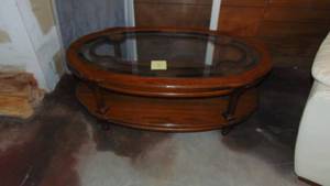 lot 96 image: Oak Oval Coffee Table with Glass Top, 45 x 17 x 25