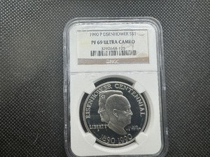 lot 28 image: 1990 S PF69 IKE Commemorative Dollar NGC