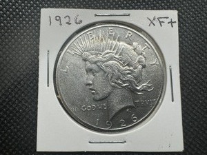 lot 38 image: 1926 Better Date XF Peace Dollar