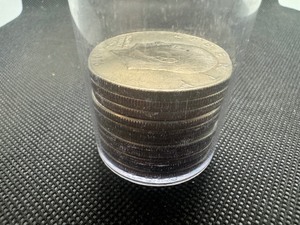 lot 47 image: Tube of (11) Mixed Clad Ike Dollars