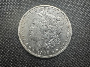 lot 58 image: 1900 O XF Morgan Dollar. Cleaned Sigma Verified.
