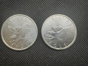 lot 67 image: (2) .999 Sunshine Mint 12 oz Rounds