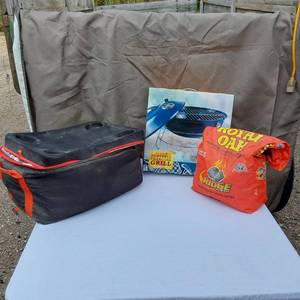 lot 17 image: Charcoal Briquettes, 14 Inch Portable Charcoal Grill, and Insulated Cooler Bag