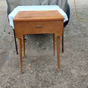 lot 22 image: Vintage Wooden Sewing Table with Hinged Top and Storage Compartment