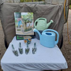 lot 25 image: Lifestyle Folding Garden Seat, Watering Cans, and Gardening Tools