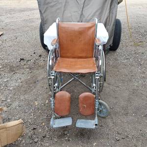 lot 33 image: Karman Healthcare Wheelchair with Brown Leather Seat and Footrests
