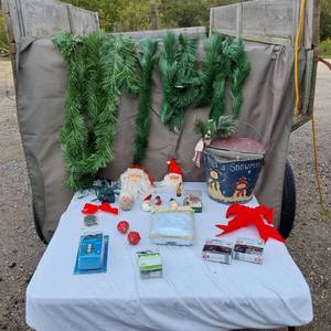 lot 35 image: Christmas Decorations and Accessories including LED Lights, Santa Figures, and Garlands