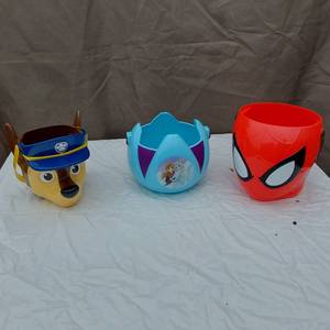 lot 58 image: Lot of Character-Themed Halloween Candy Buckets including Paw Patrol, Frozen, and Spider-Man