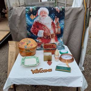 lot 65 image: Claire Burke Holiday Collectibles 2001 Plate, Santa Tapestry, and Decorative Items