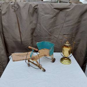 lot 89 image: Lamp, Farmers Elevator Lake Lillian Dust Pan (dented), Doll Cart