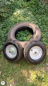 lot 12 image: Set of 3 Tires with Rims including 20575R15 and 4.804.00-8 Sizes