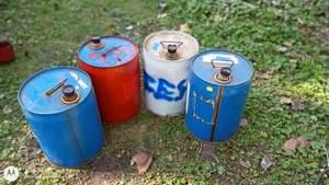 lot 18 image: Set of 4 Metal Diesel Fuel Cans with Caps and Handles