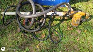 lot 19 image: VP Fuel Pump with Nozzle and Tote of Assorted Hoses