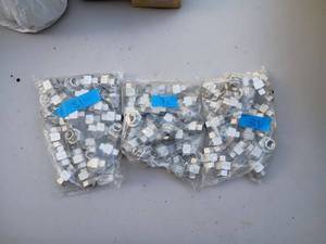 lot 31 image: 3 bags of 14 inch NPT Stainless Steel Union fittings. Approx 75 pcs. 150 PSI
