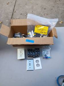 lot 42 image: Box of GFI Outlets, Electrical Switches, Circuit Breakers and Plates
