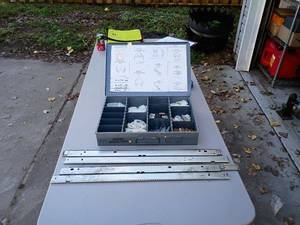 lot 61 image: Johnson Drawer Parts Organizer with Assorted Hardware and Mounting Rails