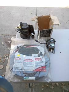 lot 69 image: Utility Pump Lot with Hose Kit and Simer Motor