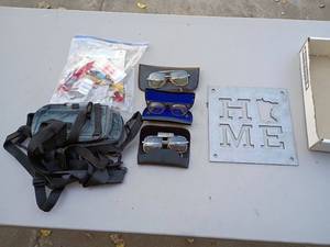 lot 79 image: Mixed Lot Vintage Eyeglasses in Cases, Metal HOME Sign, Sewing Supplies, and Shoulder Bag