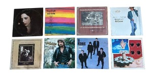 lot 247R image: R - Collection of 8 Vinyl Record Albums - Dwight Yoakam, Jerry Garcia, The Pretenders, Jerry Jeff Walker and More