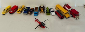 lot 123C image: K - Collection of 12 Diecast Toy Vehicles Including Trucks, Cars, and Helicopter