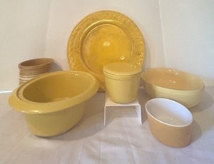lot 125C image: K - Collection of Yellow and Brown Ceramic Kitchenware Including Plates, Bowls, and Containers
