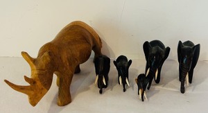lot 128C image: K - African Carved Wood Rhino and Set of 4 Elephant Figurines