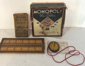lot 139C image: K - Vintage Game and Book Collection Including Monopoly, Cribbage Board, Compass, and Poor Richards Almanack