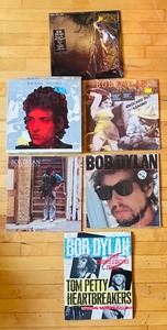 lot 174C image: LR - Collection of Bob Dylan Vinyl Records and Tour Book, Including Tom Petty & The Heartbreakers