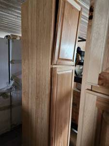 2- hickory pantry cabinets
