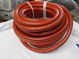 lot 118 image: Long Red Hose...