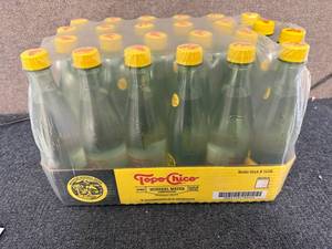 lot 129 image: 24 Bottles of Topo Chico Mineral Water