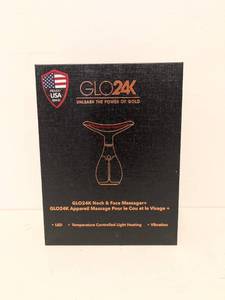 lot 23 image: GLO24K NECK & FACE MASSAGER