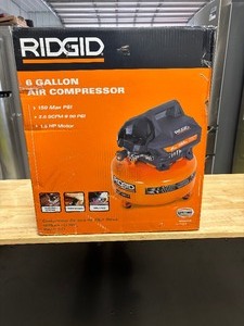 lot 03 image: Rigid 6 Gal. 150 PSI Portable Electric Oil-Free Jobsite Pancake Air Compressor with Dual Pressure Gauges and 2-Quick Couplers BRAND NEW # 02106416 MSRP $149