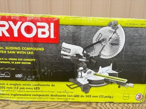 lot 20 image: Ryobi 15 Amp 12 in. Corded Sliding Compound Miter Saw with LED Cutline Indicator BRAND NEW #TSS121 MSRP $329
