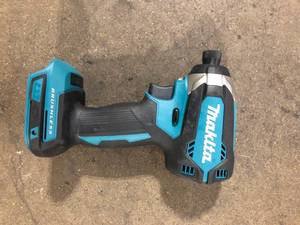 lot 37 image: Makita 18V LXT Lithium-Ion Brushless 14 in. Cordless Variable Speed Impact Driver (Tool Only)   Customer Returns See Pictures