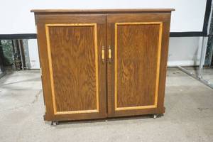 lot 53 image: Custom Wooden Liquor Cabinet on Wheels