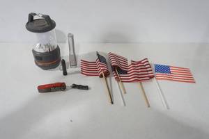 lot 162 image: Ozark Trail Lantern, Flashlights, Swiss Army Knife, American Flags