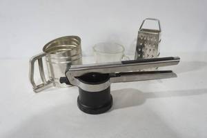 lot 167 image: Flour Sifter, Potato Ricer, Grater, Gravy BowlMeasuring Cup