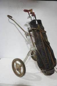 lot 225 image: Vintage Golf Bag, Cart, & Clubs (4 wood clubs)