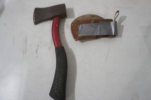 lot 310 image: Hatchet and Cover