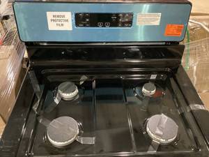 lot 506 image: Whirlpool 30-in 4 burners 5.1-cu ft Freestanding Natural Gas Range ( Stainless Steel ) (DAMAGED Please see pictures)