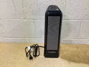 lot 379 image: Lasko 16 1500W 2 Speed Oscillating Ceramic Tower Space Heater, Black, CT16558