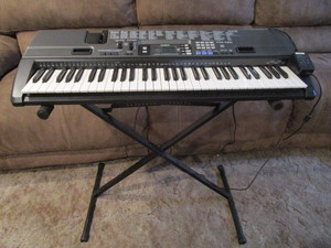 lot 54 image: Casio Keyboard & Stand