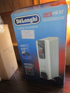 lot 169 image: DeLonghi Oil Filled Heater