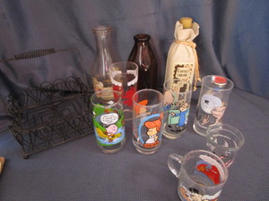 lot 237 image: Milk Bottles, Character Glasses